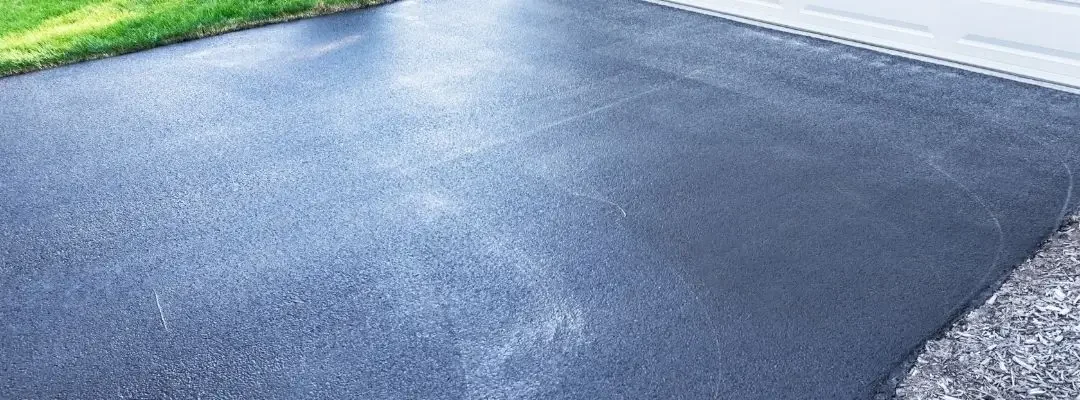 The Homeowners Guide to Maintaining Your Concrete Driveway + Avoiding Cracks