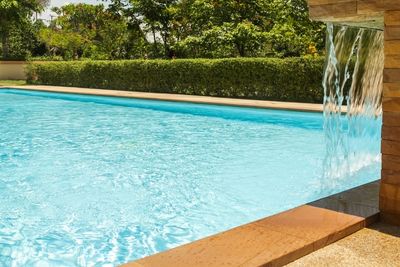 coloured concrete pool surround