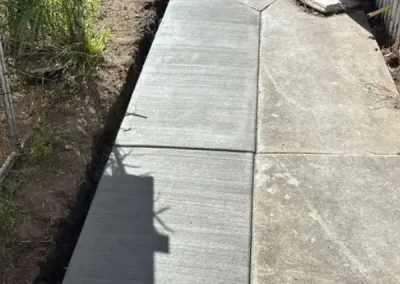 Plain concrete pathway extension Yarrabilba