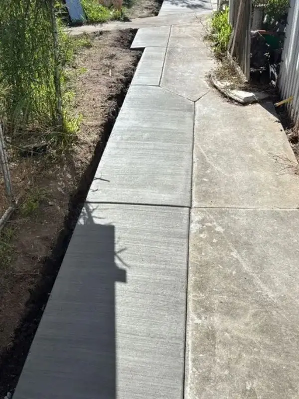 Plain concrete pathway extension Yarrabilba